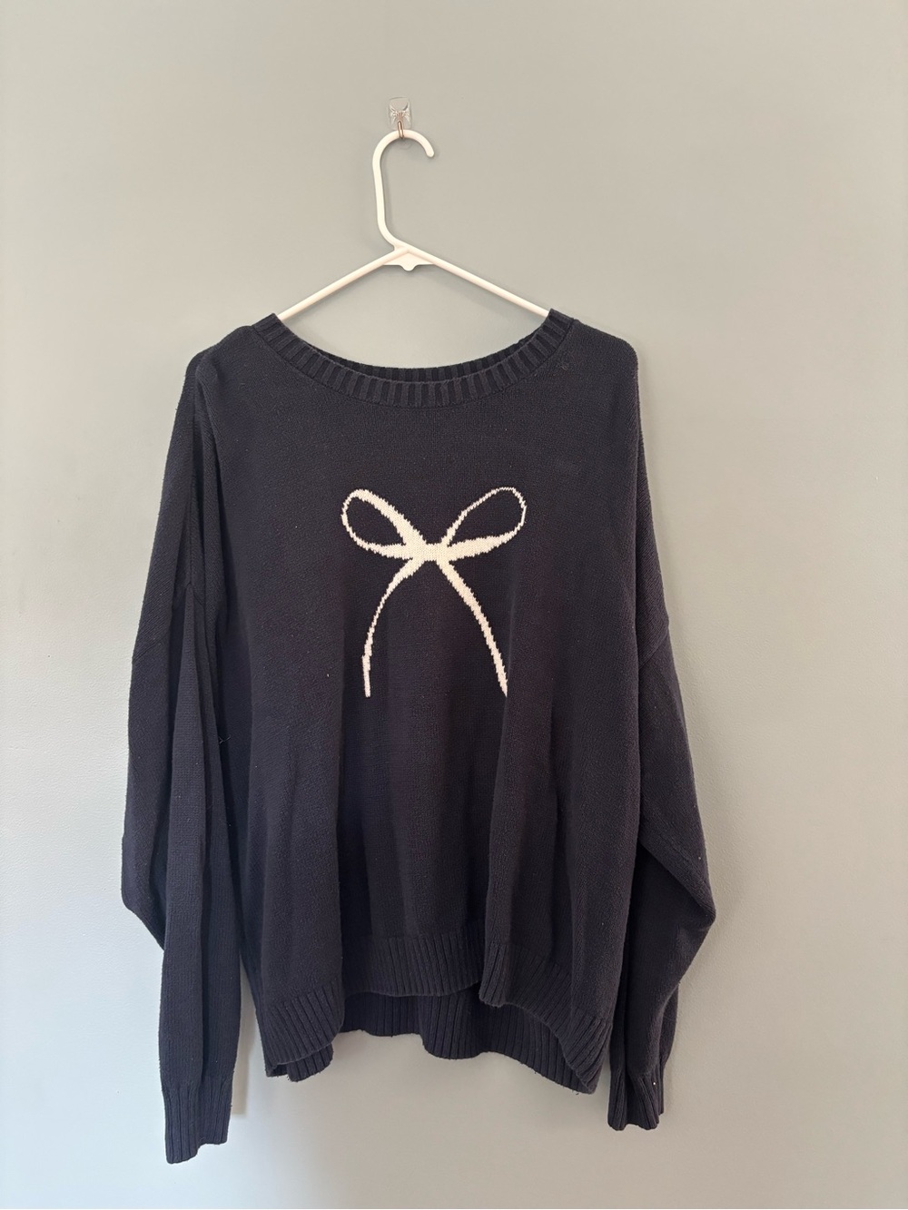 Navy sweater lite weight w white bow. Perfect for spring and early fall